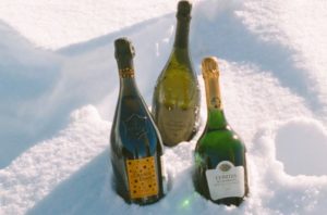 Champagne bottles in the snow